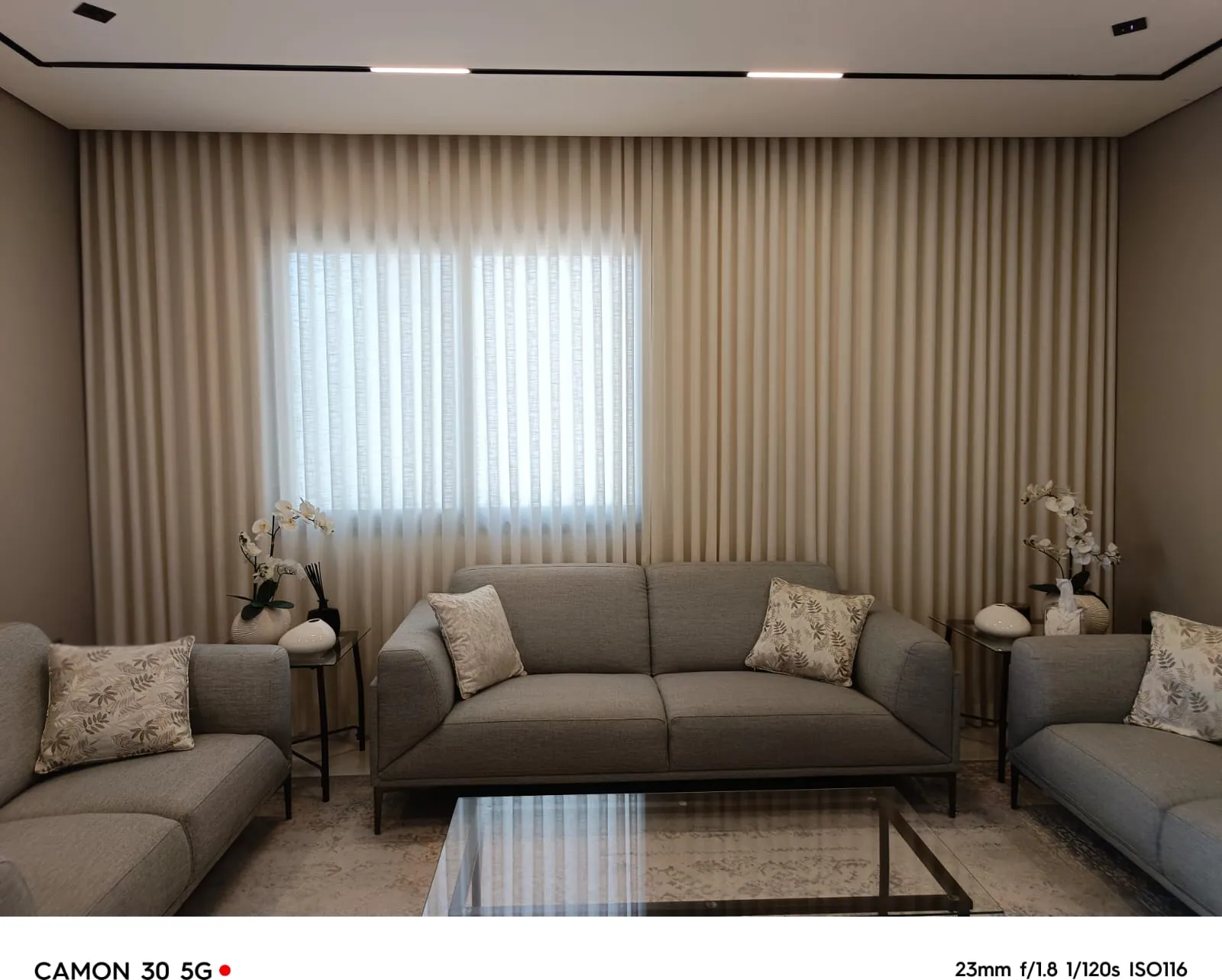 Living room sheer curtains filtering daylight in a Dammam villa