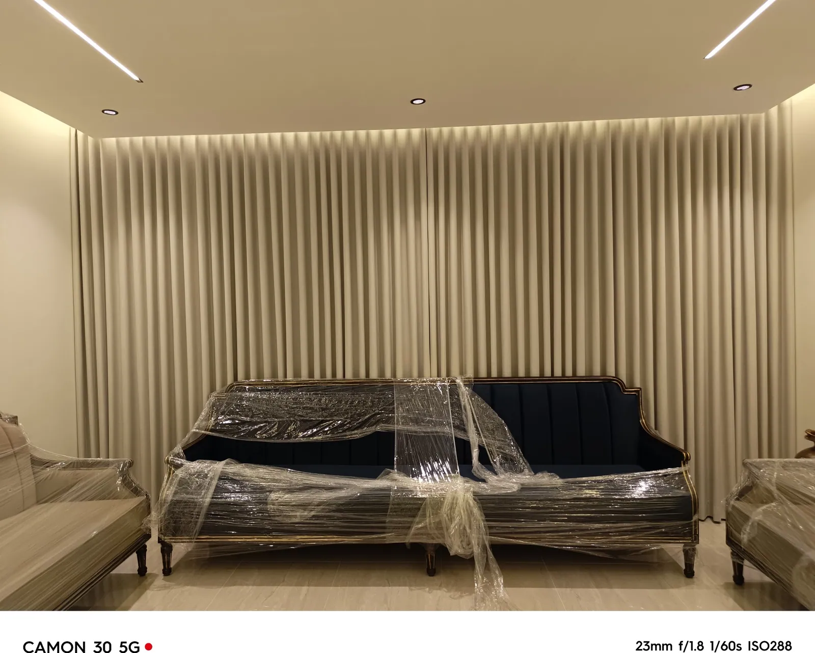 Modern bedroom curtains installed wall to wall in a villa in Khobar